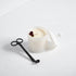 Medium white Geo candle with Mila Mae & Co wick trimmers