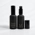 Two Mila Mae & Co French Pear room spray bottles, one with its cap off